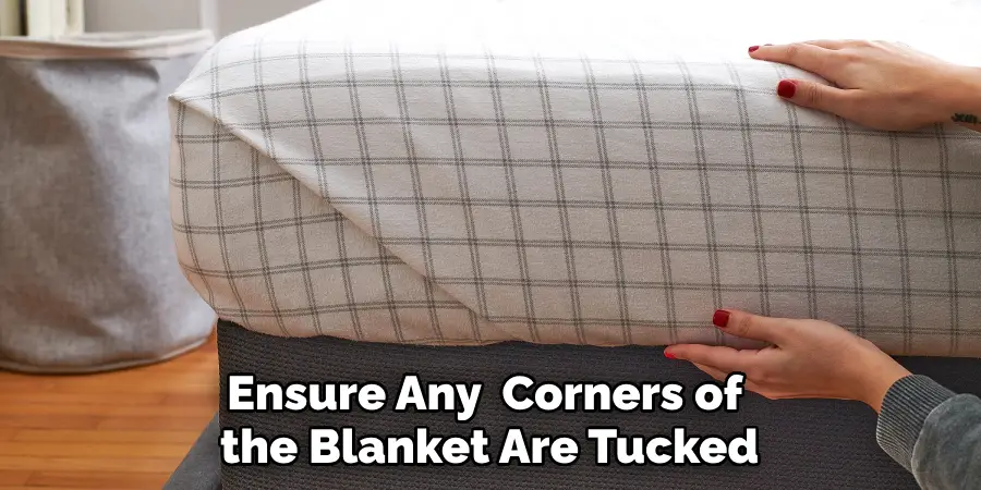 Ensure Any Corners of the Blanket Are Tucked