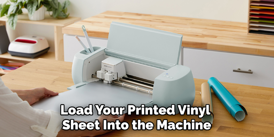 Load Your Printed Vinyl Sheet Into the Machine