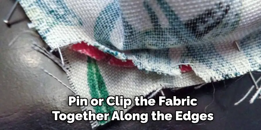 Pin or Clip the Fabric Together Along the Edges