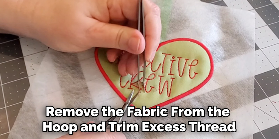 Remove the Fabric From the Hoop and Trim Excess Thread