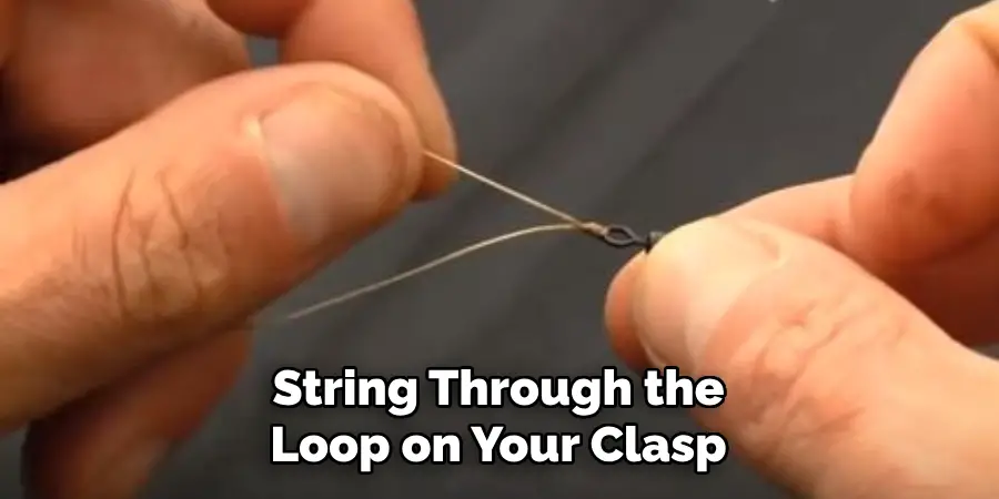 String Through the Loop on Your Clasp