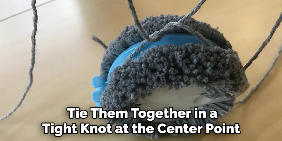  Tie Them Together in a Tight Knot at the Center Point