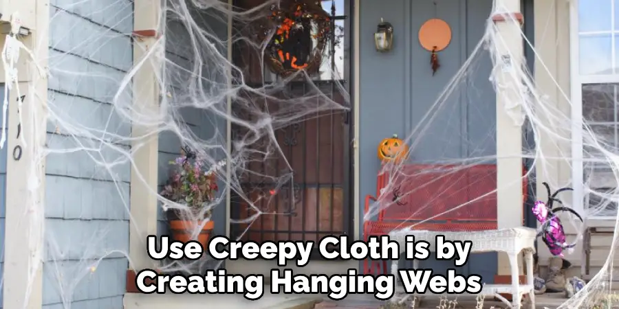  Use Creepy Cloth is by Creating Hanging Webs