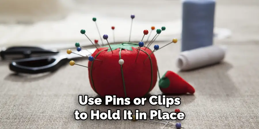 Use Pins or Clips to Hold It in Place