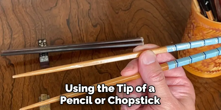 Using the Tip of a Pencil or Chopstick