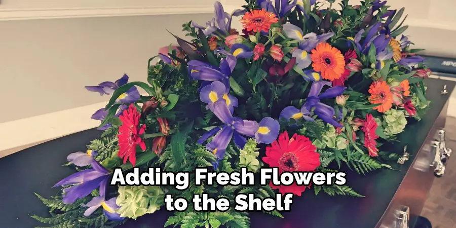 Adding Fresh Flowers to the Shelf