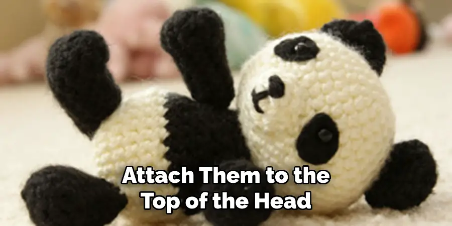 Attach Them to the Top of the Head