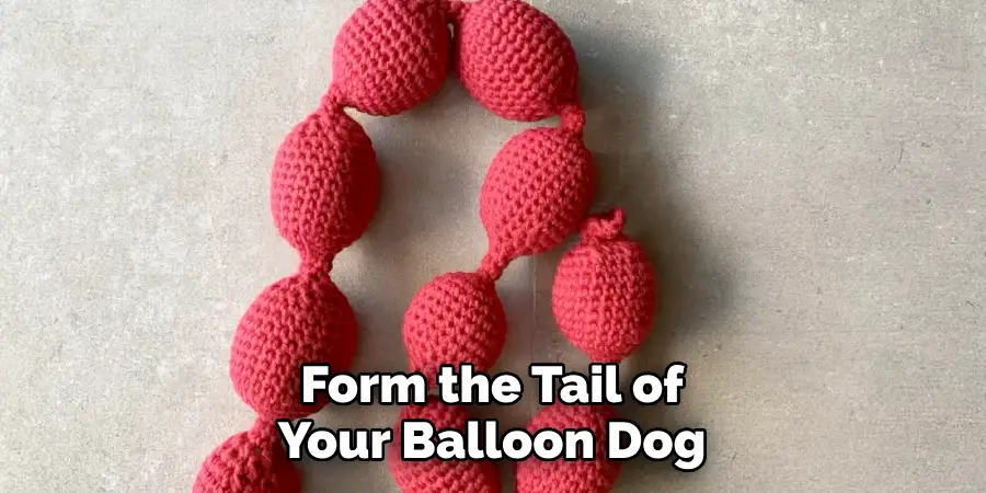Form the Tail of Your Balloon Dog