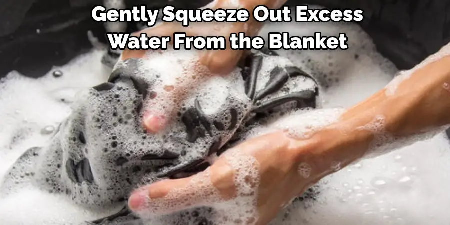 Gently Squeeze Out Excess 
Water From the Blanket