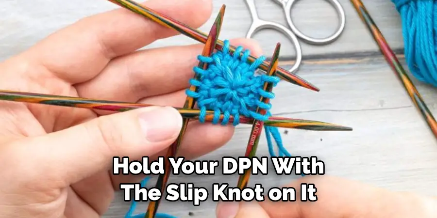 Hold Your DPN With 
The Slip Knot on It