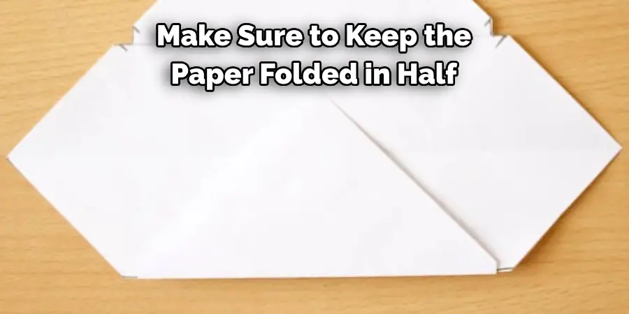 Make Sure to Keep the 
Paper Folded in Half 