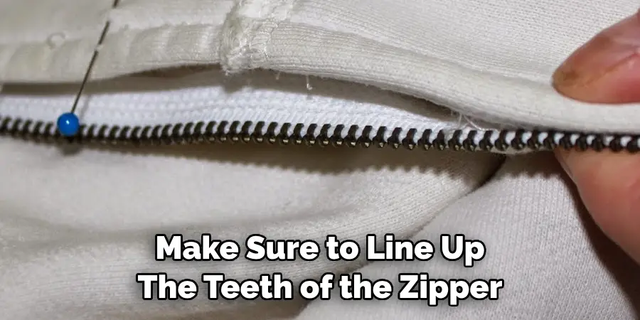 Make Sure to Line Up 
The Teeth of the Zipper