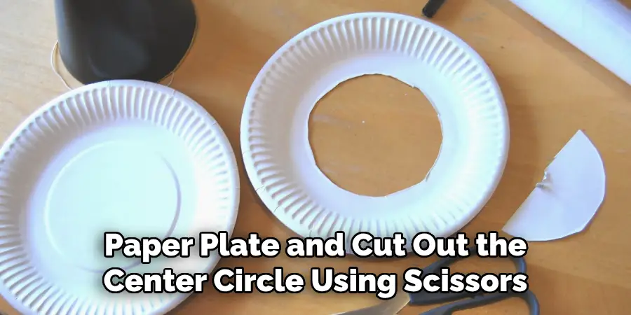 Paper Plate and Cut Out the Center Circle Using Scissors