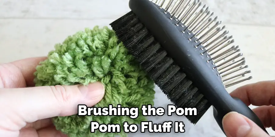 Brushing the Pom Pom to Fluff It