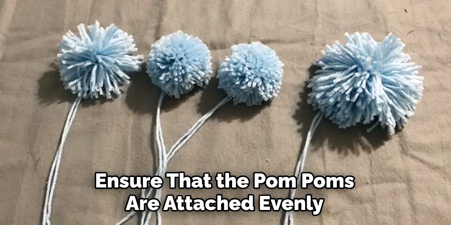 Ensure That the Pom Poms Are Attached Evenly