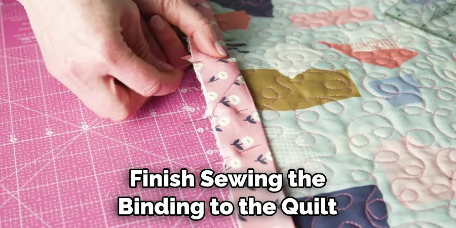 Finish Sewing the Binding to the Quilt