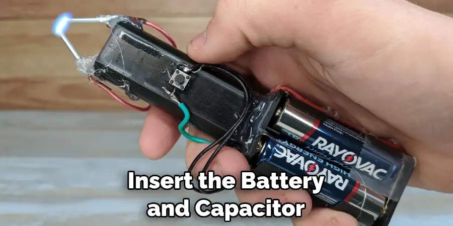 Insert the Battery and Capacitor