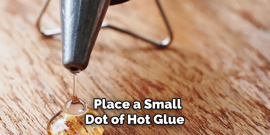 Place a Small Dot of Hot Glue 