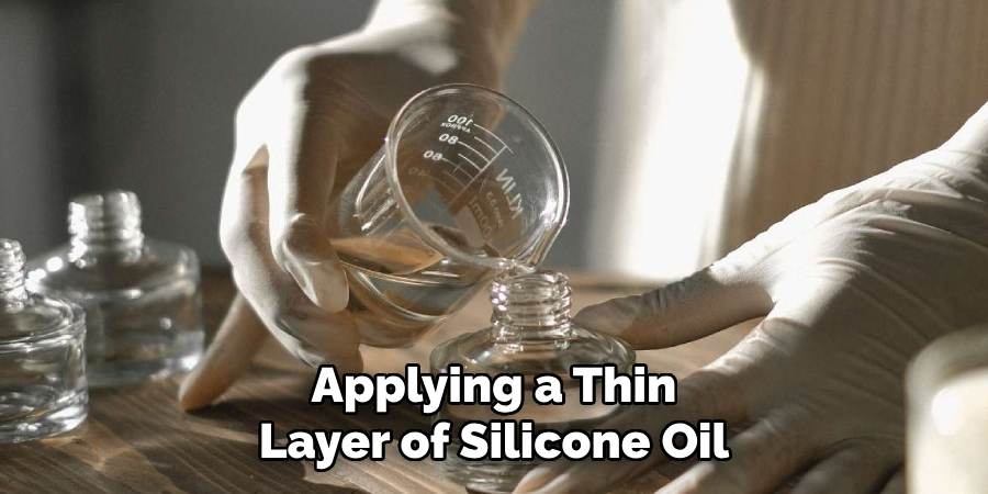 Applying a Thin Layer of Silicone Oil