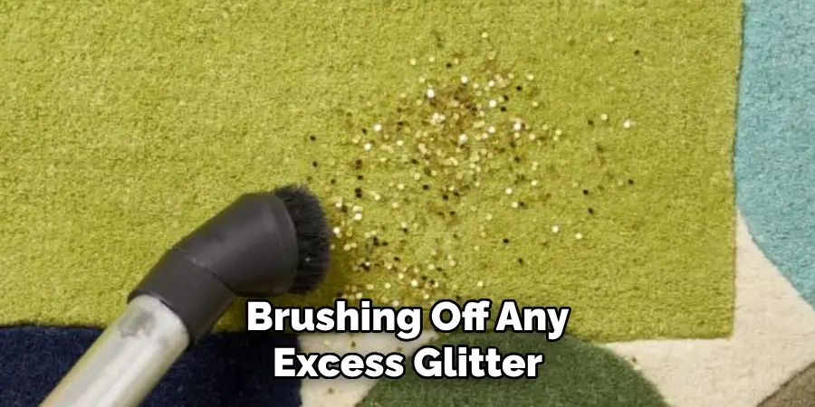 Brushing Off Any Excess Glitter