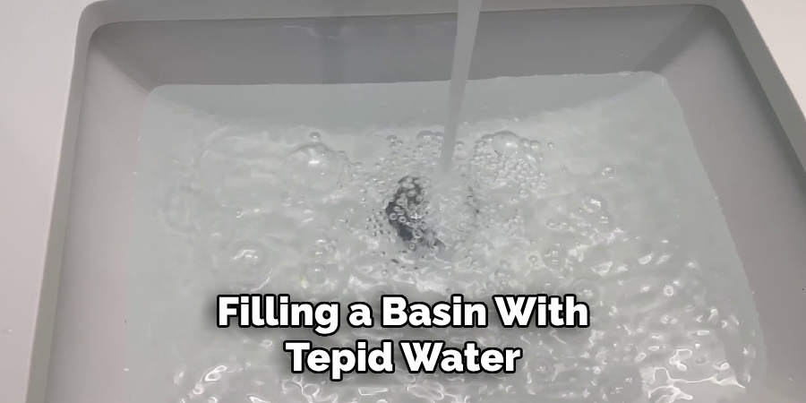 Filling a Basin With Tepid Water