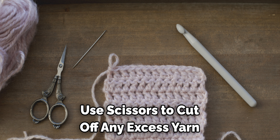 Use Scissors to Cut Off Any Excess Yarn