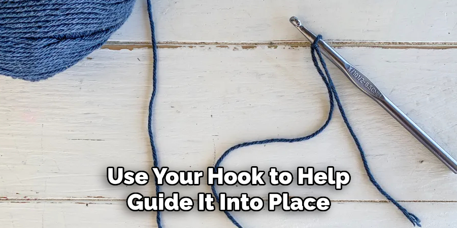 Use Your Hook to Help Guide It Into Place