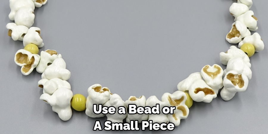 Use a Bead or A Small Piece