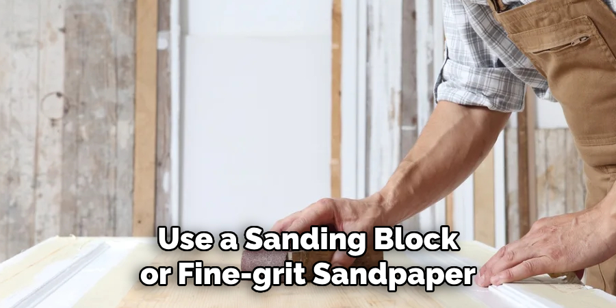 Use a Sanding Block or Fine-grit Sandpaper