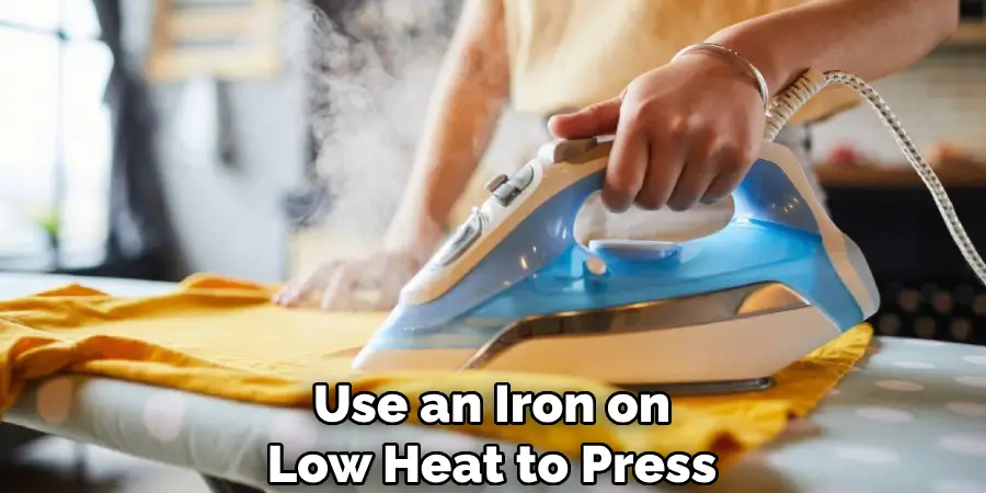 Use an Iron on Low Heat to Press