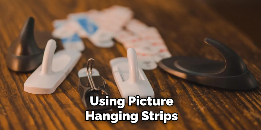 Using Picture Hanging Strips