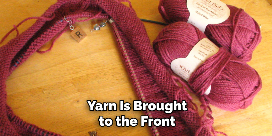 Yarn is Brought to the Front