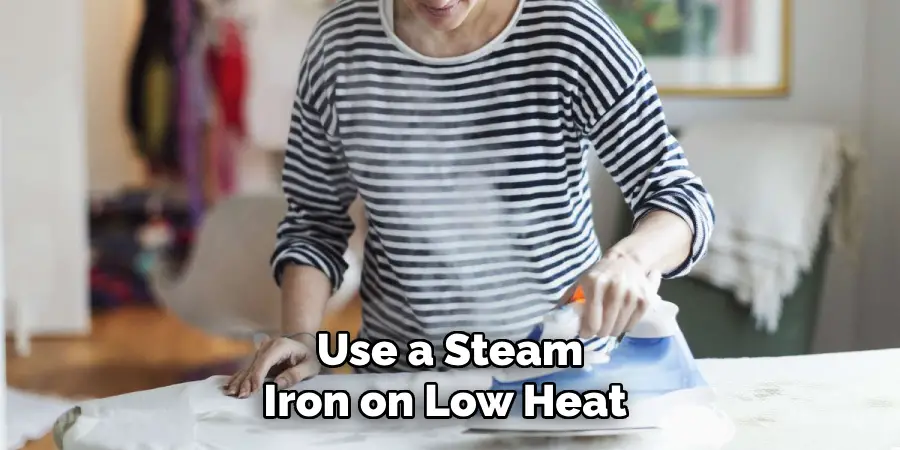 Use a Steam Iron on Low Heat 