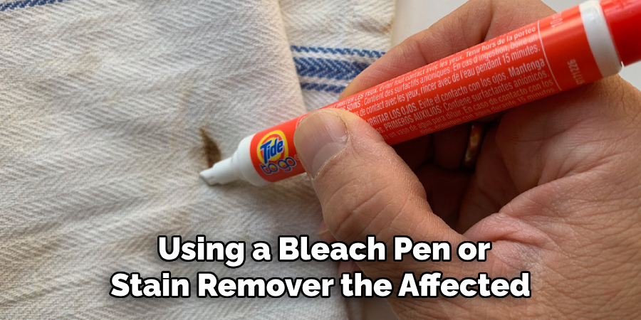  Using a Bleach Pen or Stain Remover the Affected