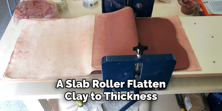 A Slab Roller Flatten Clay to Thickness