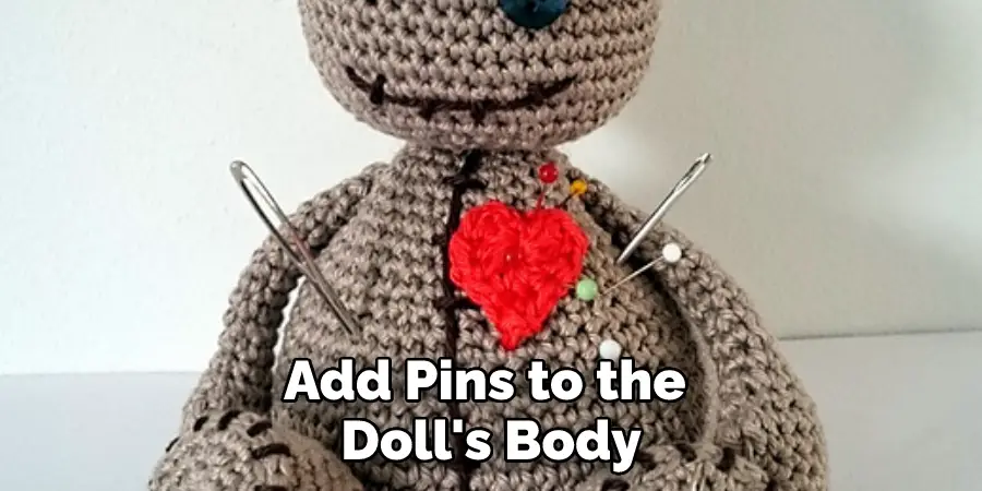 Add Pins to the Doll's Body