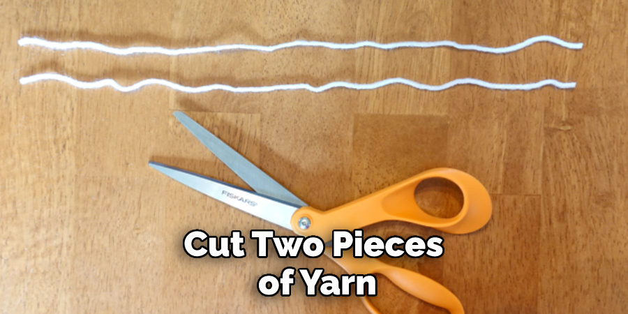 Cut Two Pieces of Yarn