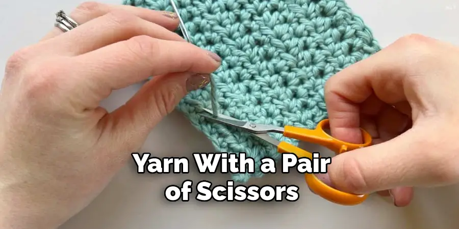  Yarn With a Pair of Scissors