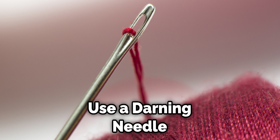 Use a Darning Needle