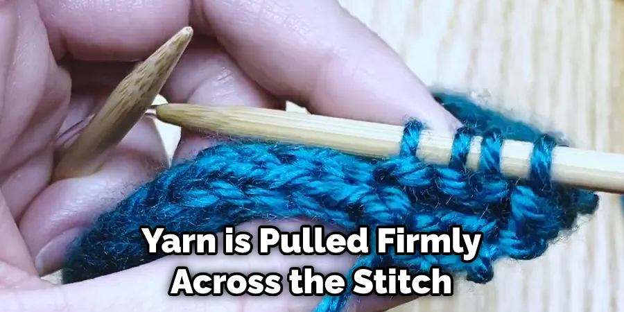 Yarn is Pulled Firmly Across the Stitch