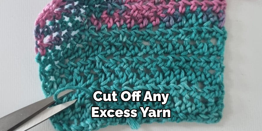Cut Off Any
Excess Yarn
