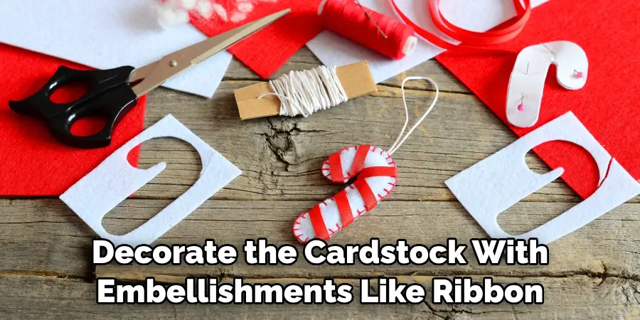Decorate the Cardstock With Embellishments Like Ribbon