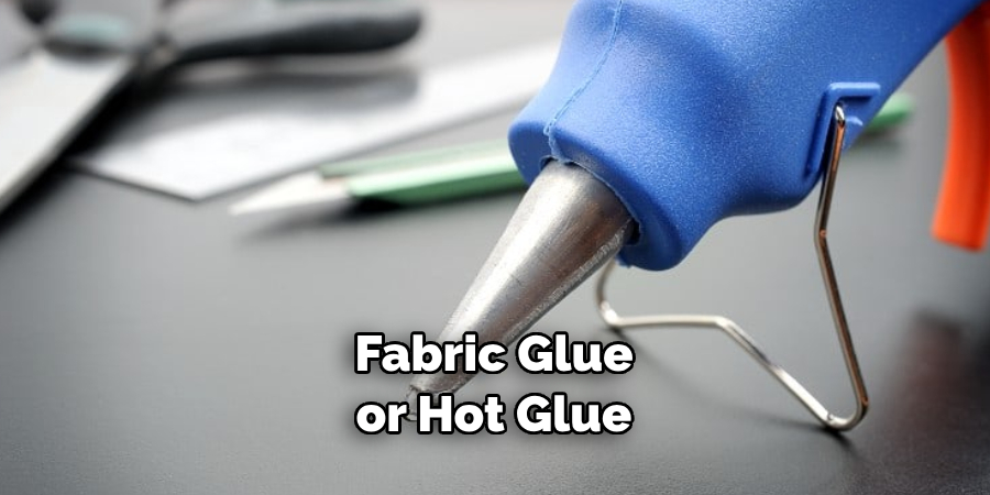 Fabric Glue or Hot Glue