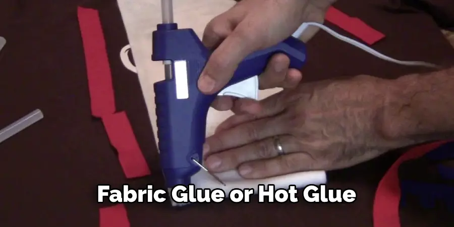 Fabric Glue or Hot Glue