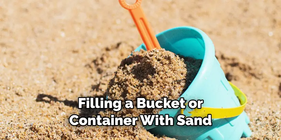 Filling a Bucket or Container With Sand