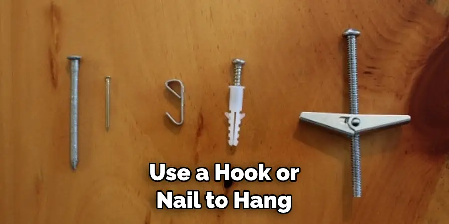  Use a Hook or Nail to Hang