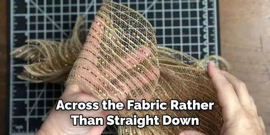 Across the Fabric Rather Than Straight Down